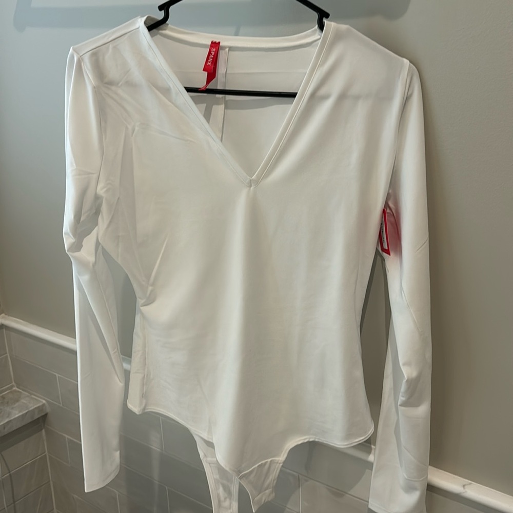 Spanx Women’s white long sleeve bodysuit NWT